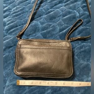 Black Leather Margot small purse. Crossbody. Travel bag. Has front pocket.